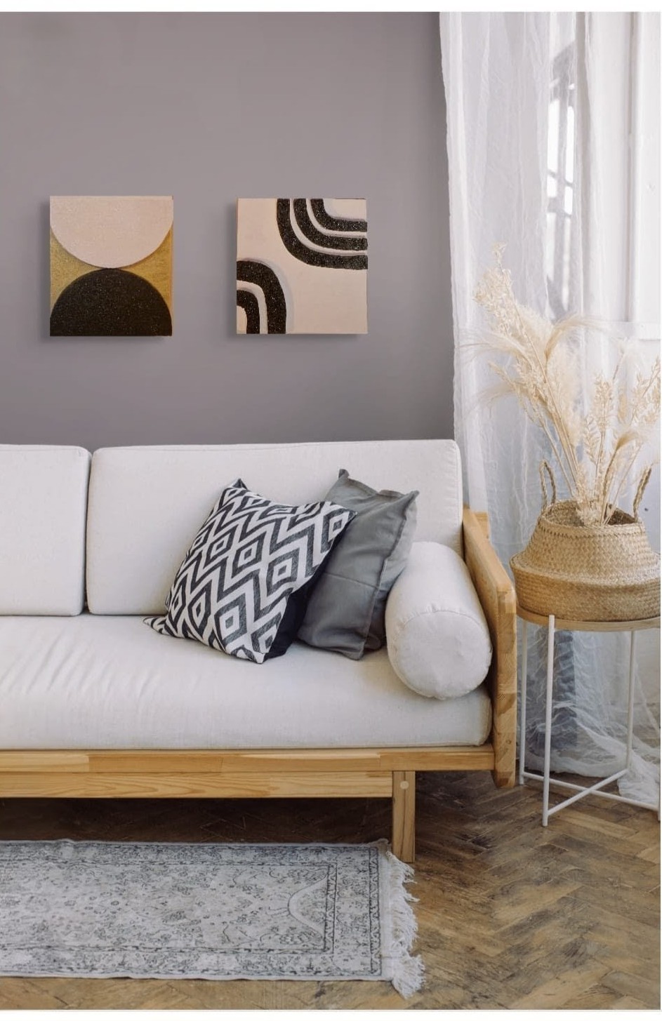 Two bespoke canvases on grey wall in situ