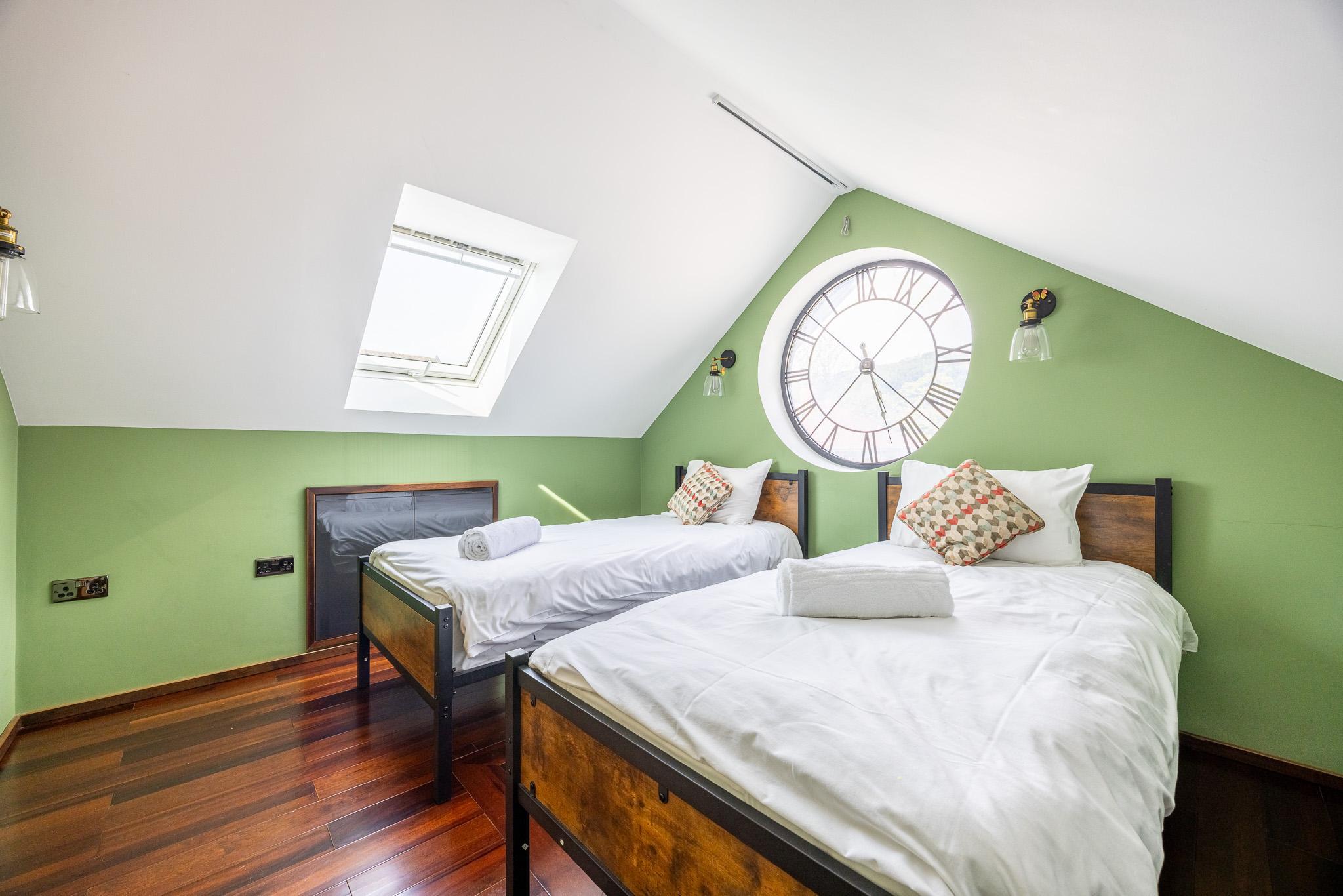 Deco Noir studio suite clock window