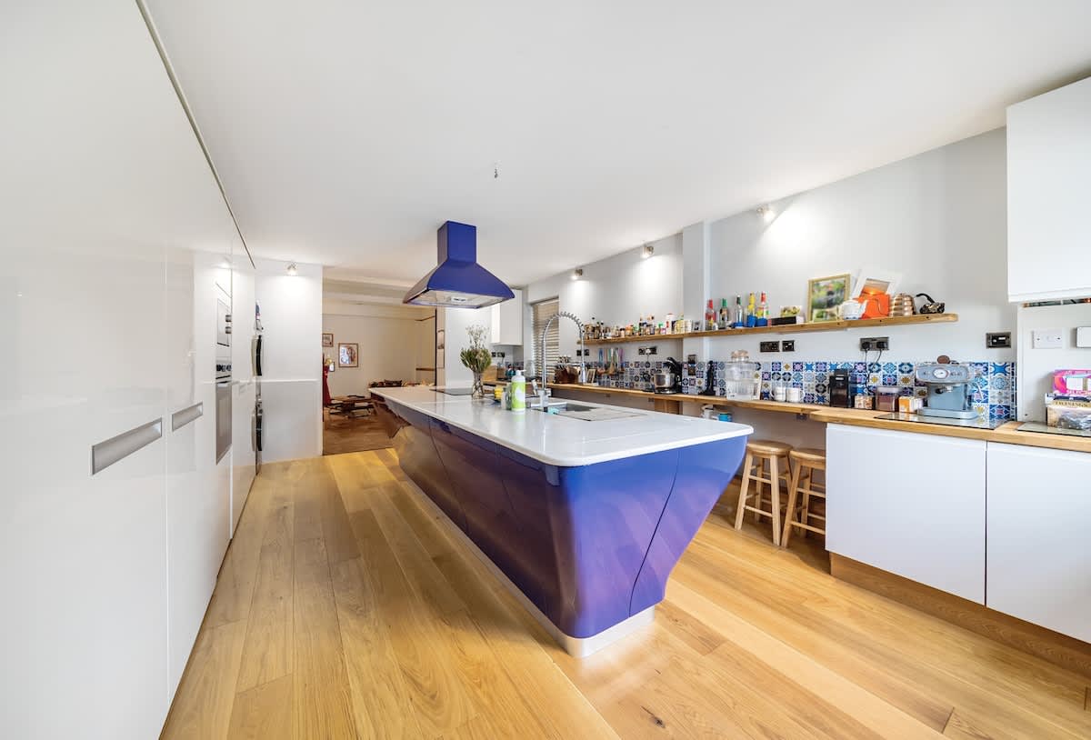 Flat kitchen blue island