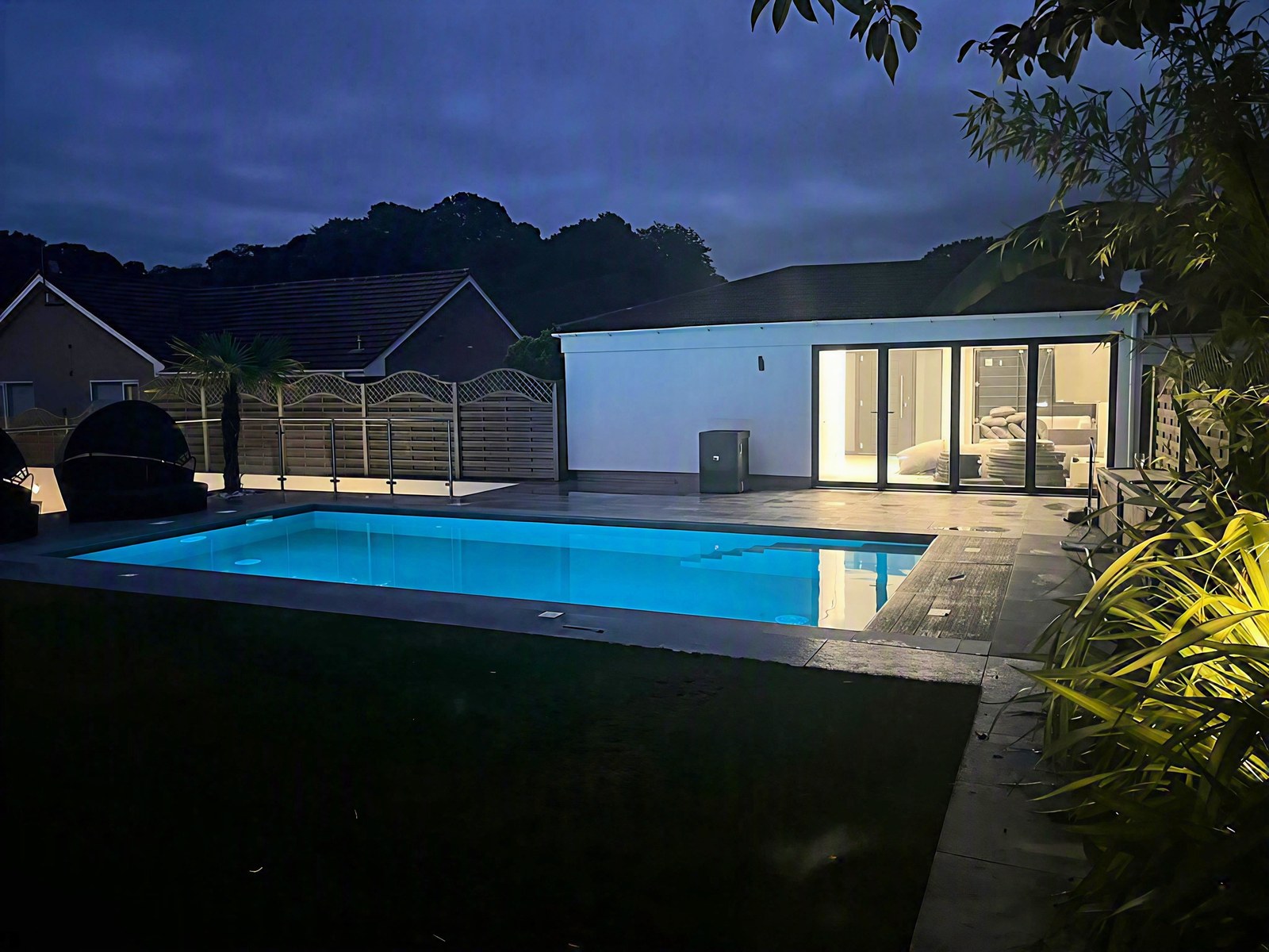 Shangri La heated pool at dusk Yatton Somerset