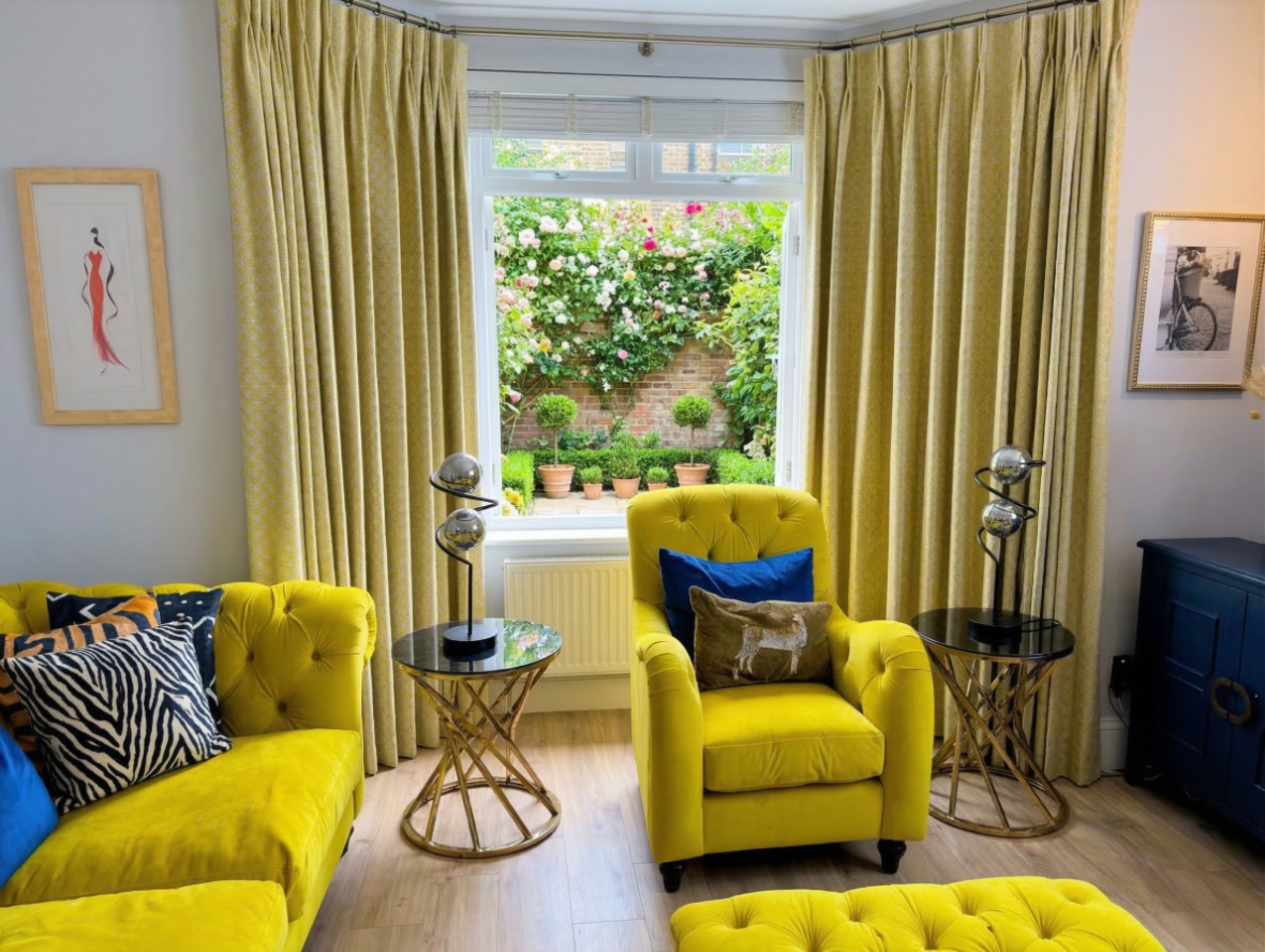 Yellow Armchair Living Room — bay window with rose garden view